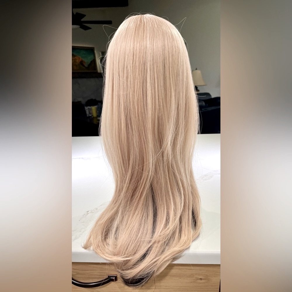 HAIR, 25” straight, layers, swoop bangs, blonde with black underneath.